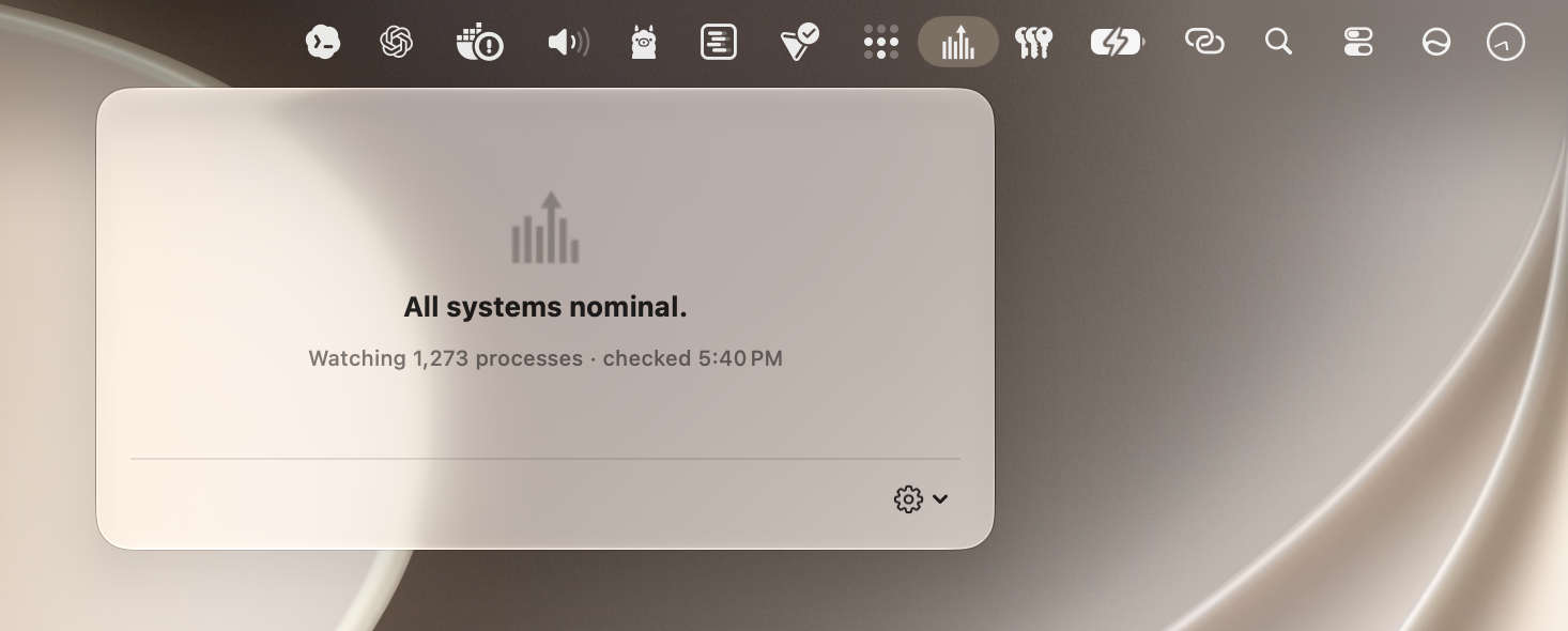 The Anomalous menu-bar popover reading All systems nominal, watching 1,273 processes.